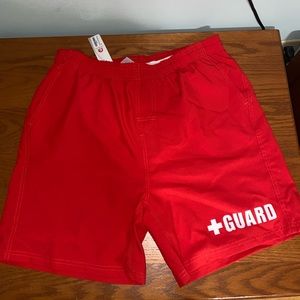 Red lifeguard trunks